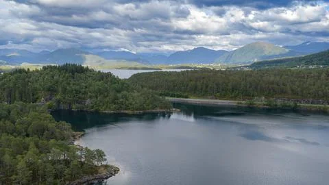 Aerial view of forested lake basin with mountains, Straumen Norway Stock-Fotos