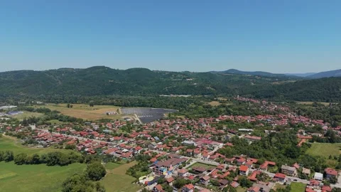 Aerial view of forests and green hills around a village in Bulgaria Stock Footage 344632288