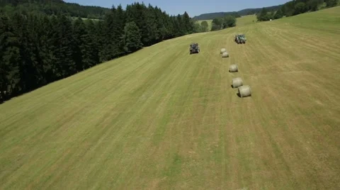 Aerial View of Forklift loading hay bales in truck Stock Footage 60603358