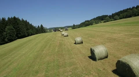 Aerial View of Forklift loading hay bales in truck Stock Footage 60603359