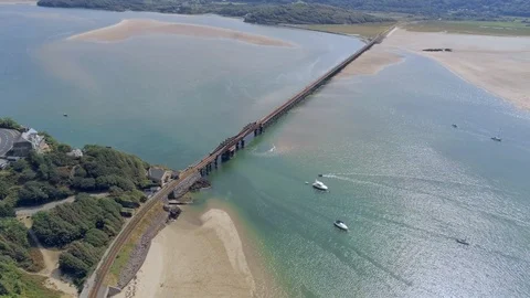 Aerial view, forward move. Drone panorama over rising tide sea, bay, anchored Video stock 94252608