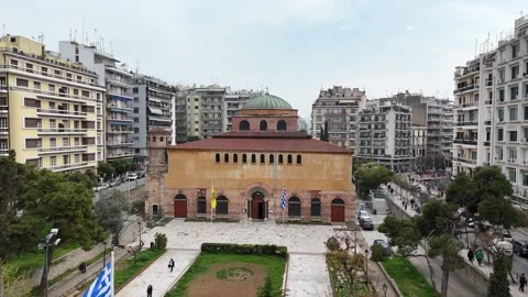 Aerial view forward towards the Holy Church of Hagia Sophia surrounded by Vídeos de archivo 306237888