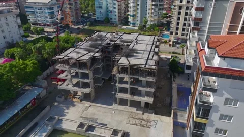 Aerial View: Foundation work in progress with precise concrete pouring and Stock-Footage 296173477