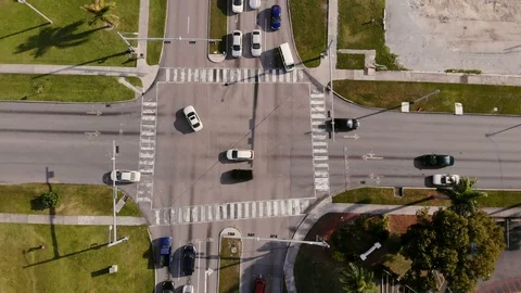 Aerial View of Four-Way Traffic Light Intersection, Freeport, Grand Bahama Stock Footage 104585558