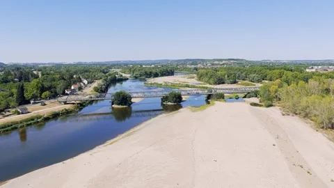Aerial view of the Fourchambault bridge spanning the Loire River in central Stock Footage 346669581