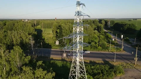 Aerial view of the frame installation of electric transmission lines Stock Footage 202230600