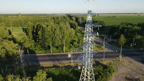 Aerial view of the frame installation of electric transmission lines Stock Footage 202230866