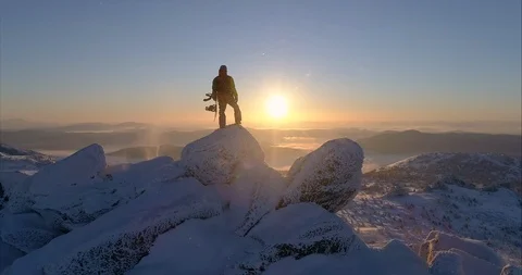 Aerial view. Freerider stands on top of the mountain 118794553
