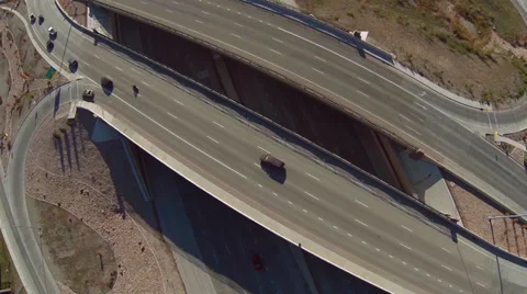 Aerial view of freeway overpass with traffic below Stock Footage 32220907