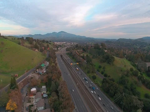 Aerial view of Freeway Road Traffic, Green Hills - California Highway - Cars Video stock 85017983