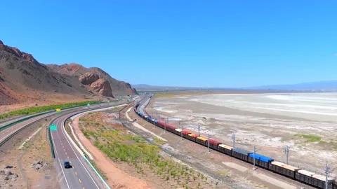 Aerial view of freight train at Alashankou Port along the Silk Road in Stock Footage 340183801