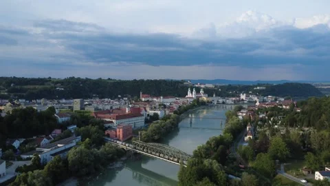 Aerial view of a freight train crossing the Inn bridge in Passau Видео 339649943