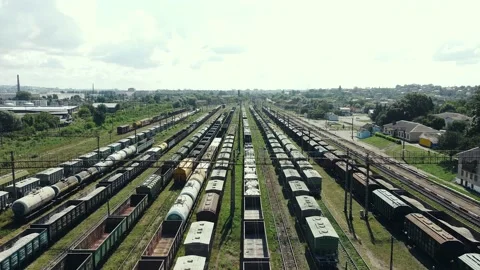 Aerial view of freight train depot station with cargo outside the city sunny day Stock Footage 137448732