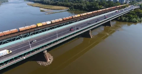 Aerial View Of Freight Train Moving On A Bridge Stock Footage 93339660