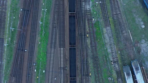 Aerial view of a freight train transporting coal on a railway Stockbeeldmateriaal 348198587