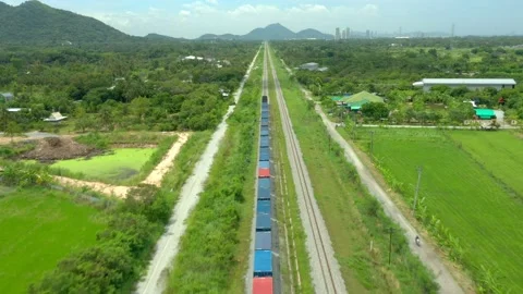 Aerial view of freight trains with containers, freight trains are moving. logist Stock Footage 209233381