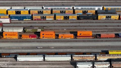 Aerial view of freight trains moving in a large railyard in Dallas 動画素材 340527820