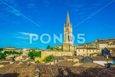 Aerial view of French village Saint Emilion dominated by spire of the monolit Stock Photos