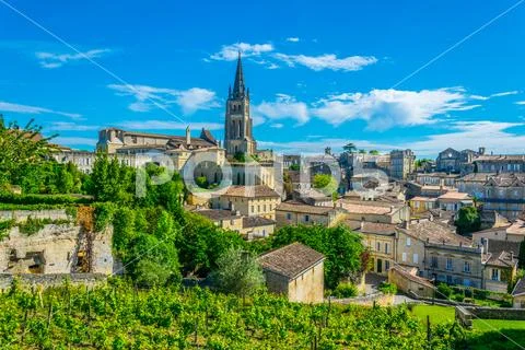 Aerial view of French village Saint Emilion dominated by spire of the monolit Stock Photos