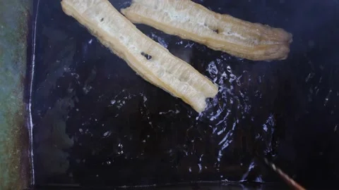 Aerial view of fried bread stick Video stock 165220084