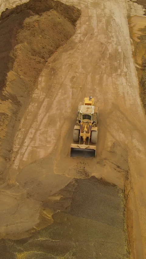Aerial View Of Front Loader Working At Quarry Construction Site Stock Footage 333362855