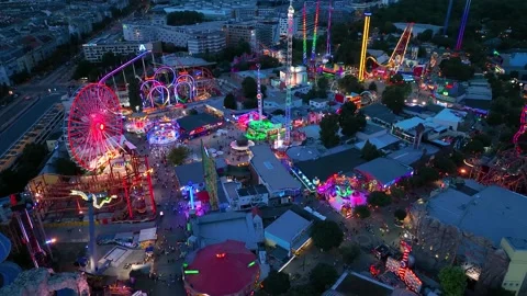 Aerial view fun fair. Twilight time illumination Vienna city Stock Footage 207494408