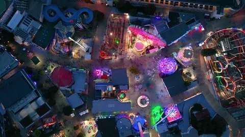 Aerial view fun fair. Twilight time illumination Vienna city park Prater Stock Footage 211965578