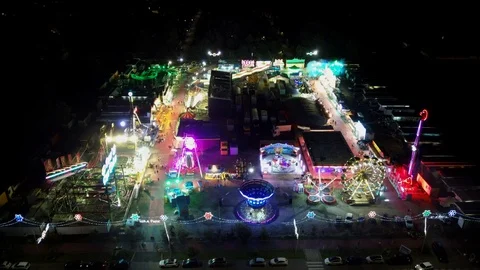 Aerial view of a funfair at night Stock Footage 116894073