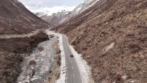 Aerial view of G317 mountain valley road in Garze County Stock Footage 340217434