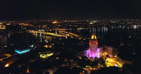 Aerial view of Galata Tower and Goldenhorn, Istanbul at night Stock Footage