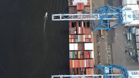 Aerial View of Gantry Crane Loading and Unloading Ship Stock Footage 99848298