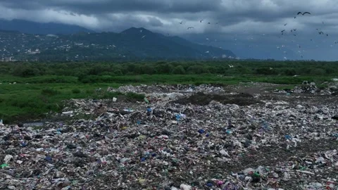 Aerial view of garbage dump near resort town on seashore in Batumi Видео 249253253