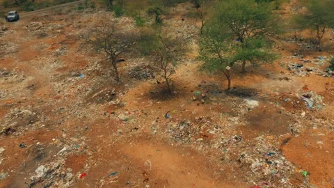 Aerial view of garbage dump in Thar Desert polluting the landscape Stock Footage 341850702