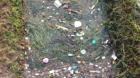 Aerial view garbage in the river. Environmental issue. Видео 118251075