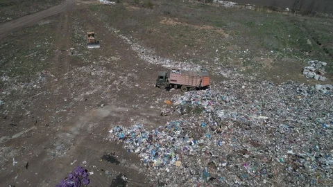 Aerial view of garbage truck at landfill Stock-Footage 120806053