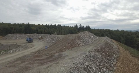Aerial view garbage trucks unload garbage to a landfill. Plastic  crisis. Stock Footage 120942617