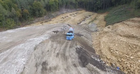 Aerial view garbage trucks unload garbage to a landfill. Plastic  crisis. Stock Footage 120942788