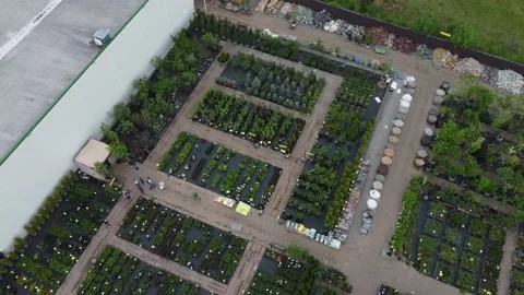 Aerial view of garden shop. working people. potted plants Stock Footage 200088170