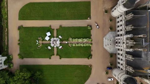 Aerial View of Garden Wedding Setup at Historic Castle Stock Footage 306448116