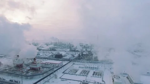 Aerial view of gas processing plant at winter time. Cold morning at industrial Stock Footage 80094771
