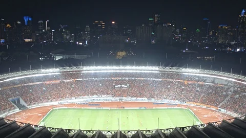 Aerial view off GBK football stadium, night match with lots of crowds and Stock Footage