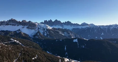 Aerial view of Geisler mountain range. Winter scenery in the Alps Stock Footage 225899449