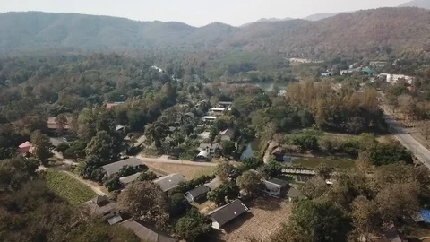 Aerial View of Generic Campus Style Area Near Grassy Hills Stock-Footage 123737619