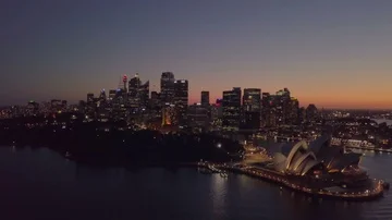 Aerial view of generic cityscape skyline at sunset night Stock Footage 86092155