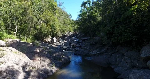 Aerial view gently down the river stream Stock Footage 90539738