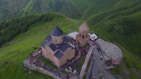 Aerial view of Gergeti Trinity Church, Tsminda Sameba. Kazbegi. Georgia 2017 Video stock 83319255