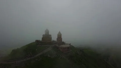 Aerial view of Gergeti Trinity Church, Tsminda Sameba. Kazbegi. Georgia 2017 스톡 동영상 83335464