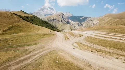 Aerial view of Gergeti Trinity Church, Tsminda Sameba. Kazbegi. Georgia 2017 Stock Footage 106501386