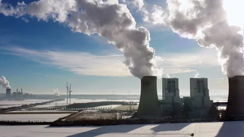 Aerial view of a German coal-fired power station against the light in winter Stock Footage 263181963