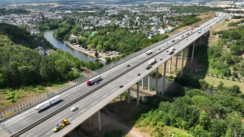 Aerial view of German highway A3 and highway-bridge Stock Footage 340327474